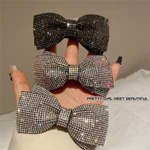Sparkling rhinestone bow hair clips in black, colorful, and silver for women