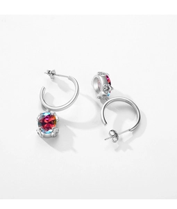 Detail of S925 sterling silver earrings with colorful zircon stones and hallmark
