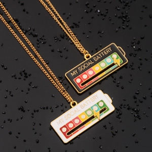 Detail of My Social Battery enamel necklace showing gradient color status and slider