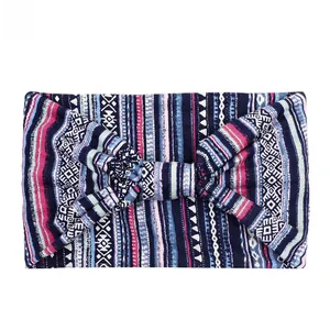 Close-up of bohemian wide headband with blue geometric patterns and elastic fabric