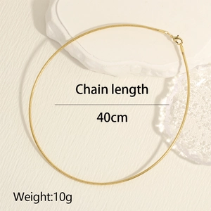 Detailed view of an 18K gold-plated flat snake chain with 40cm length and 10g weight