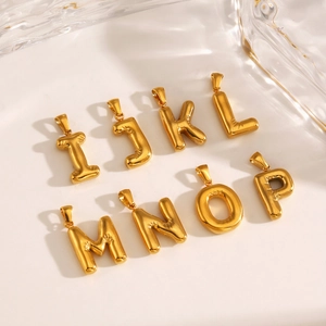 Polished gold bubble initial pendants from I to P in puffy stainless steel design