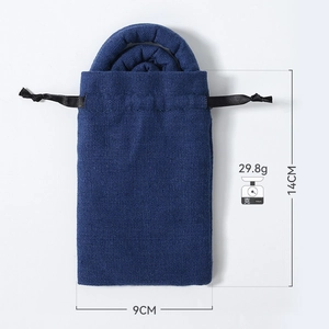 Detailed view of 14cm ethnic fabric storage pouch for spiral hair ties with weight specs