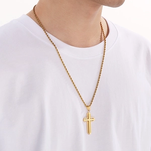 Men's gold hollow cross necklace with rope chain on model in minimalist style