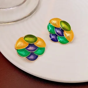 Elegant floral stud earrings with multi-color enamel petals in yellow, green and purple