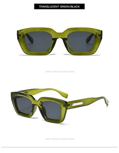 Detail view of translucent green square sunglasses with silver metal temples and black lenses