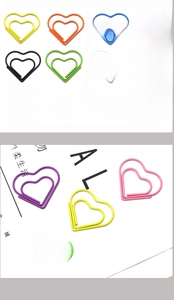 Close-up of assorted colorful heart-shaped paper clips for office and bookmarking use