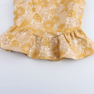 Elegante ärmellose beige Jacquard-Bluse mit floralem Muster und Schößchen-Detail an der Taille