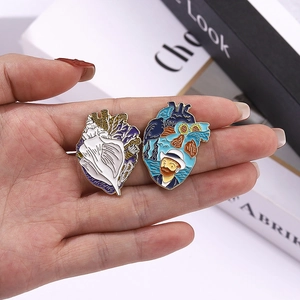 Artistic oil painting heart-shaped enamel pin set featuring Van Gogh and shell designs