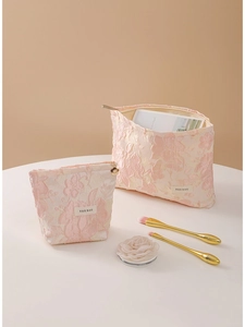 Pink embossed floral toiletry bags set of two for makeup and travel storage