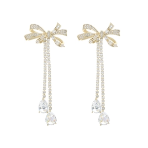 Elegant gold bow earrings with micro-pave zircons and long tassel drop pendants