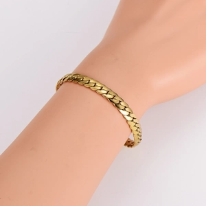 Nahaufnahme einer minimalistischen goldenen Drachen-Gliederkette aus Edelstahl für Herren