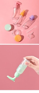 Macro view of 7-piece travel bottle set with colorful lids and a squeeze bottle in use