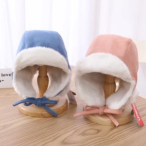 Winter bomber hat for kids featuring thick faux fur lining and soft suede finish