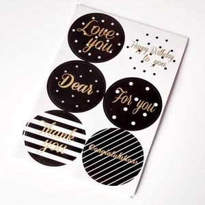 Set of 6 gold foil thank you stickers with dots and stars for gift packaging