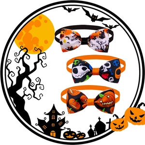 Detailed view of Halloween pet bow ties featuring pumpkin and bat prints on ribbed ribbon