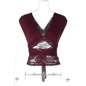 Detail of burgundy lace patchwork on deep V-neck crop top with strappy waist ties