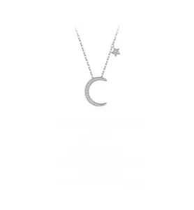 Detail showing S925 silver moon and star pendant necklace with sparkling pavé zircons