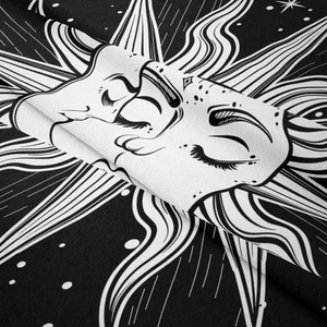 Detailed macro shot showing the fine fabric texture of sun and moon tapestry