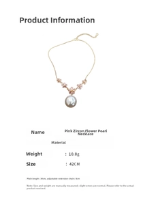 Detail view of pink zircon flower necklace with a large white imitation pearl drop