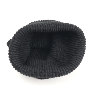 Unisex black knitted beanie hat with classic thick rib knit for winter outdoor warmth