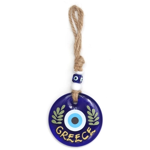 Close-up of blue glass evil eye charm with Greece text and natural jute rope detail