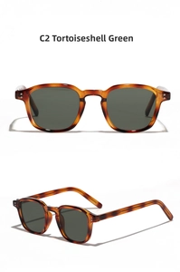 Macro detail of retro tortoise frame sunglasses with dark green lenses and silver studs