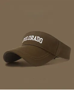Detail of Colorado letter embroidery on dark brown brushed cotton sun visor cap