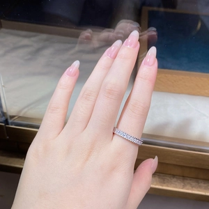 Close-up of S925 sterling silver eternity ring with pavé-set shimmering zircon stones