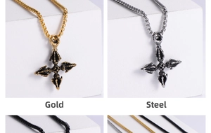 Close-up of vintage religious cross pendant in gold and steel finishes with embossed details