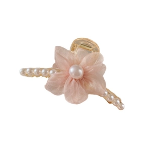 Elegant gold metal hair claw clip with pink mesh flower and delicate pearl accents