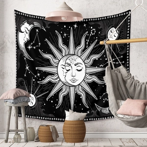 Bohemian sun and moon tapestry with black and white celestial patterns for wall decor