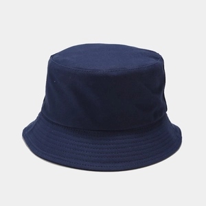Detailed texture of navy cotton twill fabric on a minimalist foldable bucket hat