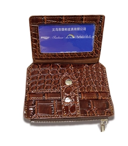 Detailed interior of crocodile texture wallet with card slots and a clear ID window