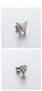 Détail des boucles d'oreilles papillon et cœur en zircon argenté avec fermoir à vis