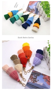 Macro view of tiered cotton tassel keychain with colorful layers and golden lobster clasp