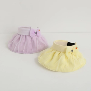 Detail of girls mesh sun hat with knitted headband and decorative side bow ornament
