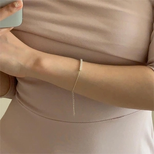Elegant S925 sterling silver chain bracelet with white zircon inlay on a woman wrist