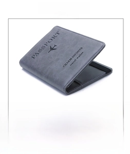 Internal layout of grey RFID passport holder showing multiple card slots and passport pocket