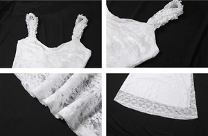 Détails de la dentelle florale blanche et de la confection de cette robe élégante