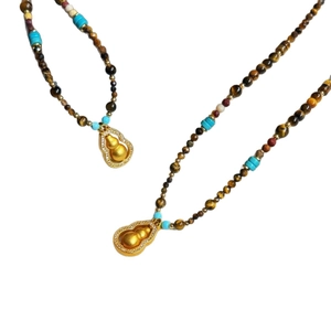 Tiger eye stone necklace with turquoise beads and gold zircon gourd pendant
