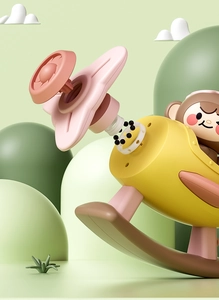 Detail of detachable propeller component on yellow cartoon airplane toy for babies