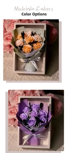 Detail view of peach and purple soap rose flower gift boxes with just for you ribbons