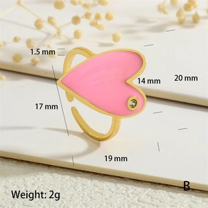 Detail showing the 17mm pink enamel heart ring with measurements and 2g weight data