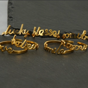 Adjustable golden stainless steel letter ring with lucky and blessed engraved words