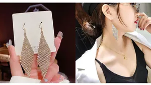 Detailed view of S925 sterling silver tassel earrings with sparkling diamond pavé finish