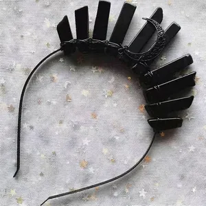 Detail of gothic black moon headband with crystals and handcrafted wire wrapping
