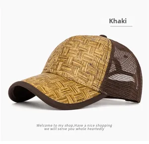 Detail of khaki straw woven baseball cap with breathable brown mesh fabric panels