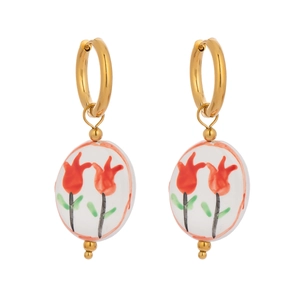 Detailed close-up of golden hoop earrings featuring red tulip enamel ceramic pendants