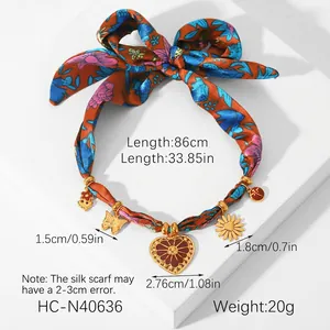 Silk scarf necklace with golden butterfly and floral pendants featuring detailed size specs